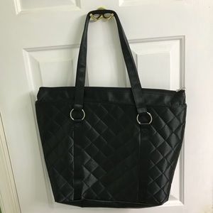 Large black bag with textured detailing